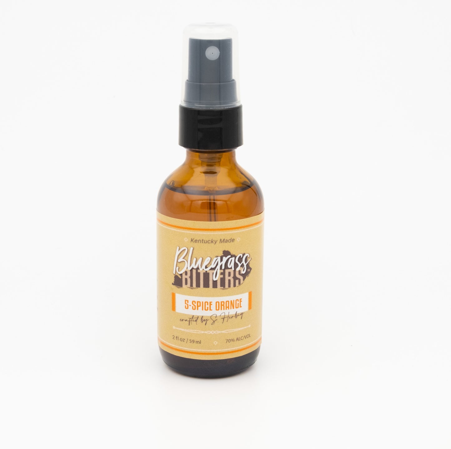 Bottle of Bluegrass Bitters with a black spray cap on a white background