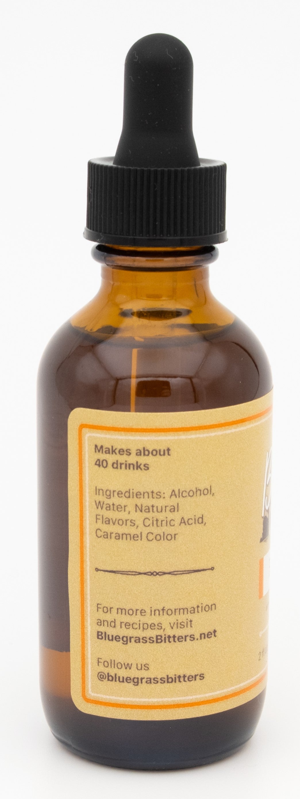Bottle of bitters with a dropper on a white background